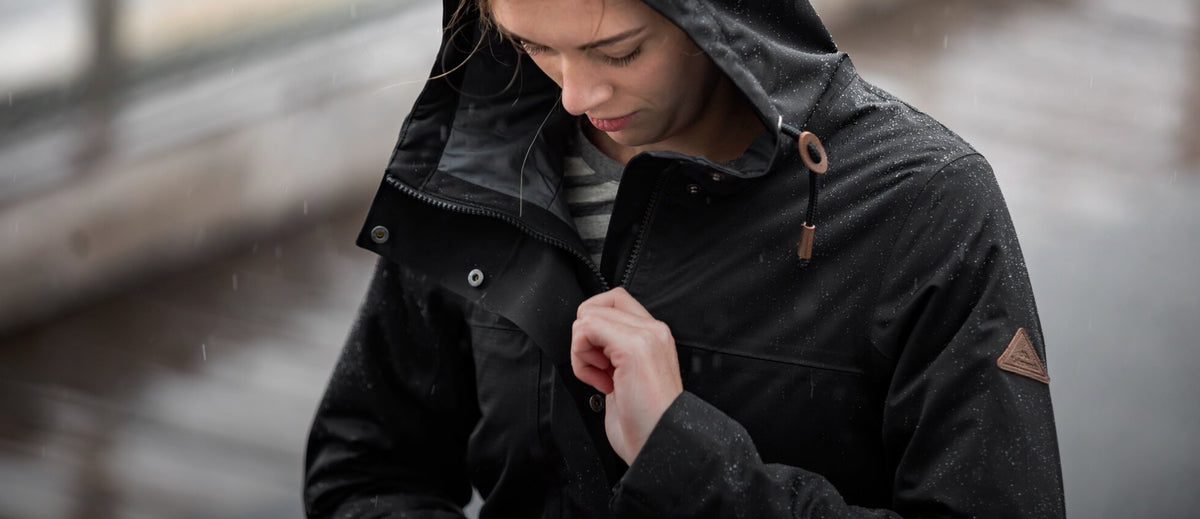 Girl closing her zipper jacket