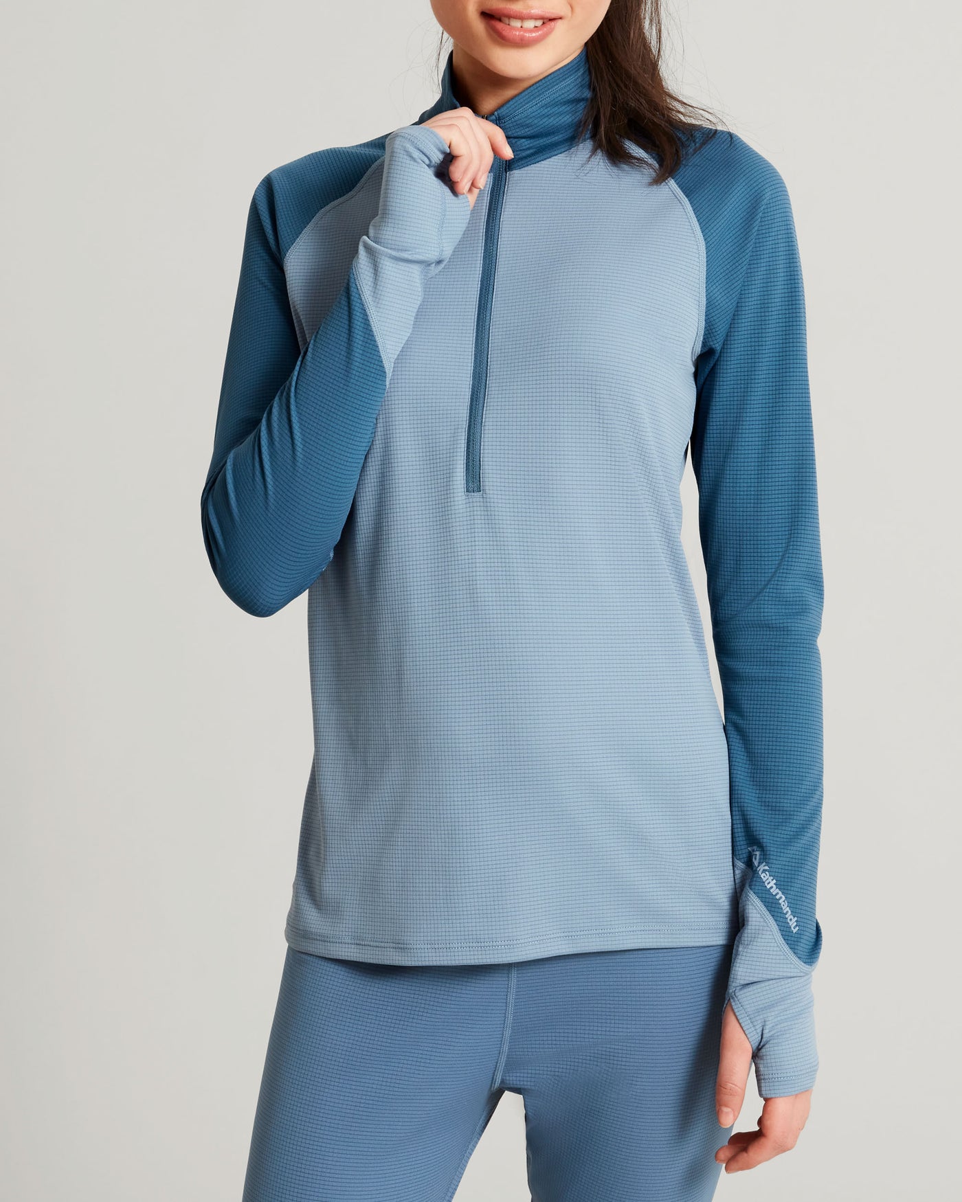 a1477_nwy_kmdaction_womens_quarter_zip_long_sleeve_top_blue_a_1765238229000